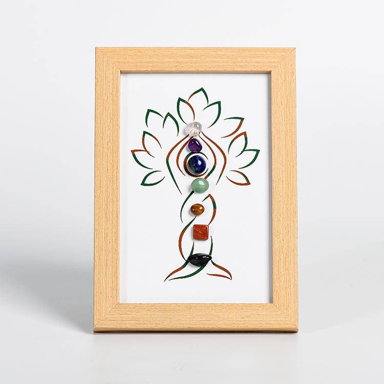 Seven chakras tree-like crystal stone picture frame on the table